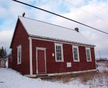 View of western side and main facade of the Otterbury School House, Harbour Grace, NL.  Photo taken November 1, 2005.; Heritage Foundation of Newfoundland and Labrador, 2004