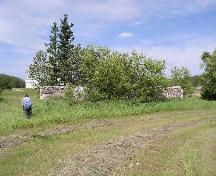 View west at remnant stone walls, 2004.; Government of Saskatchewan, Marvin Thomas, 2004.