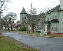 Looking west on Collins Street, Collins Heritage Conservation District, Yarmouth, NS, 2005. At center is the former Tabernacle Congregational Church, now the Yarmouth County Museum. The houses to each side are part of the museum complex.; Heritage Division, NS Dept. of Tourism, Culture and Heritage,
2005.

