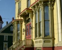 A detailed view of the bay windows and front entrance of the George and Mary Ellen Guest House, Yarmouth, NS, 2006.; Heritage Division, NS Dept. of Tourism, Culture and Heritage, 2006
