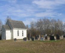 View of church and cemetery, 2005.; Government of Saskatchewan, J. Kasperski, 2005.