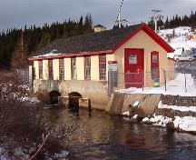 Exterior photo of Port Union Hydro-Electric Station; view of building showing water source which travels below the station. Photo taken January 2006.; HFNL/ Lara Maynard 2006.
