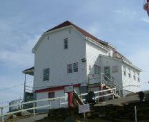 A northwest perspective of the lightkeepers' dwelling at the Cape Forchu Lightstation, Cape Forchu, Yarmouth County, NS, 2006.; Heritage Division, NS Dept. of Tourism, Culture & Heritage, 2006