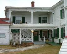 The two storey veranda on the west side of the north ell of Churchill Mansion, Darling's Lake, Yarmouth County, NS, 2006.; Heritage Division, NS Dept. of Tourism, Culture & Heritage, 2006