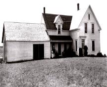 The barn was attached to the east side of the builidng when the residence was still occupied by the Lutes family in c1950.; Moncton Museum