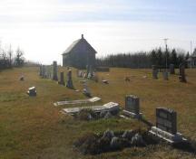View of Orkney Church from north-east featuring the cemetery, 2005.; Government of Saskatchewan, Michael Thome, 2005.