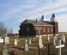 View of church and cemetery at St. Mary's Church and Site from north-west corner of site, 2005.; Government of Saskatchewan, Michael Thome, 2005.