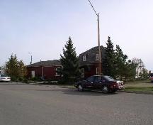 View from west, showing rear elevation and mansard roof, 2003.; Government of Saskatchewan, Jennifer Bisson, 2003.