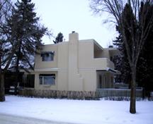 View of the Hyndman Residence looking toward the west elevation along 136 Street and the rear elevation that faces south (January 2005); City of Edmonton, 2005