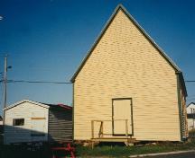 Exterior view of side and rear facade, Bailey's Cove Church of England School, Bonavista; HFNL 1998