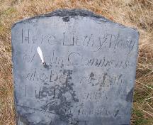 Oldest recorded headstone in cemetery, dated December 8, 1746 in memory of John Commons. Photo taken December, 2005.; HFNL/Andrea O'Brien 2005