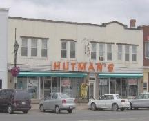 Photo of the Hutman's Store façade, taken in front Greco Pizza Donair.; Société hitorique du Madawaska.