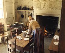 Interior view - kitchen and stove of Blackhall, one of the buildings of the Village Historique Acadien; Village Historique Acadien