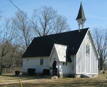 View of the church with its bell-turret perched above the west end.; PNB 2005