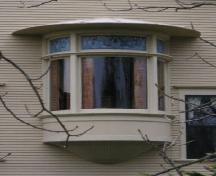 Detail of the oriel window with curved glass in the east side of the William L. Lovitt House.; Heritage Division, NS Dept. of Tourism, Culture & Heritage 2006