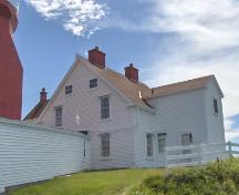 Northern facade of Long Point Lightkeeper's Double Dwelling, Crow Head, NL. Photo taken August 2006. ; HFNL 2006