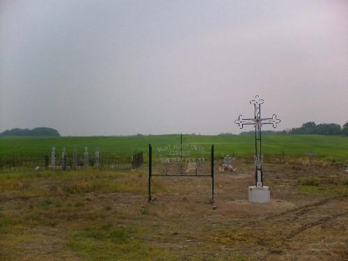 View of Cemeterysignage and headstones