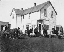 General store, Dickson (circa 1918) - The hitching posts were replaced with gasoline pumps in 1920.
; Glenbow Archives, NA-2485-1
