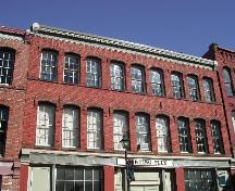 This photograph shows the contextual view of the building and its relationship with the neighboring buildings, 2004 ; City of Saint John