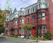 This photograph shows the contextual view of the complex. The T. William Bell Residence is the second building in the picture, 2004; City of Saint John