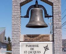 The inscription “Caroline” is clearly visible on the monument. Caroline Guimond was the bell's sponsor.; Town of Edmunston