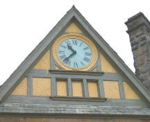 Gilbert H. Grosvenor Hall clock in the west gable.; Heritage Division, NS Dept. of Tourism, Culture and Heritage, 2004.