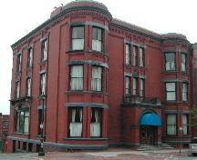 This photograph shows the contextual view of the building on Germain and Princess Street, 2005; City of Saint John