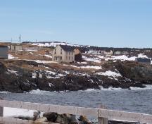 Photo view of Robert Tilley House (showing front gable end and right side) and environs, Elliston, NL, 2007/03/26; L Maynard, HFNL, 2007