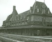 View of the west elevation of the railroad station, 1973.; Parks Canada Agency/Agence Parcs Canada, 1973.
