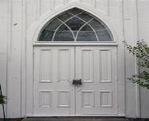 Main door of Mayne Corners Methodist Church, showing lancet window over doorway; OHT