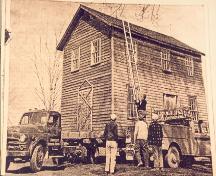 Historic image of the house being relocated by owner Jack Thompson - 1964; Jack Thomson, 1964