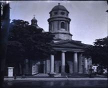 A view of St. George's Cathedral showing one of the porticos and a tower – 1923; Archives of Ontario