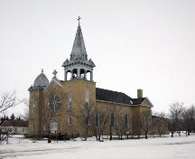 View of main elevations, from the southeast, of the Sacred Heart of Jesus Roman Catholic Church, Fannystelle, 2005; Historic Resources Branch, Manitoba Culture, Heritage, Tourism and Sport, 2005
