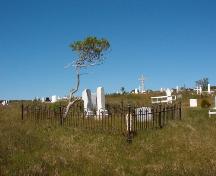 View of cemetery showing gravemarkers and plot fencing.  Photo taken September 2006.; HFNL/ Dale Jarvis 2006
