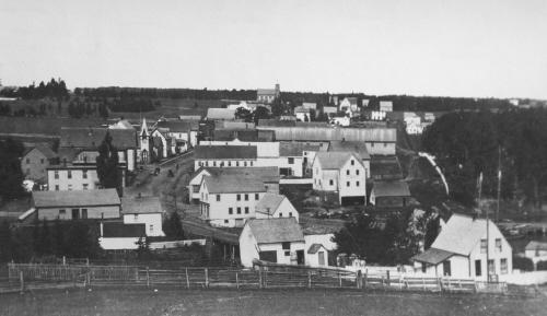 View of town c. 1900 with brick church in distance