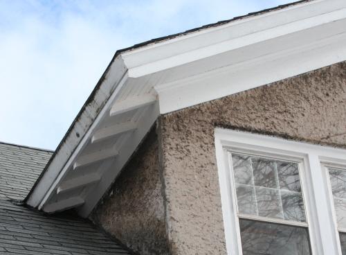 Showing detail of dormer with stucco wall