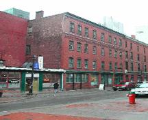 Photograph of the building looking north on Canterbury Street towards King Street and illustrating the building's relationship with the neighbouring buildings; City of Saint John 2004