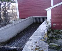 Sluiceway directing water to horizontal water wheel, Barrington Woolen Mill, Barrington, NS, 2007.; Dept. of Tourism, Culture and Heritage, Province of NS, 2007
