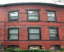 This image provides a view of the curved two-storey bay windows, 2005.; City of Saint John