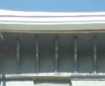 This image shows the cornice supported by scroll shaped brackets, 2005. ; City of Saint John
