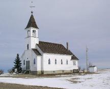 View northeast at entrance and south side of church building, 2003.; Government of Saskatchewan, Jennifer Bisson, 2003.