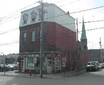 This photograph shows the contextual view of the building, 2005.; City of Saint John
