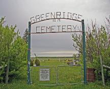 Contextual view, from the west, of the main gate of Green Ridge Cemetery, Dominion City area, 2006; Historic Resources Branch, Manitoba Culture, Heritage, Tourism and Sport, 2006