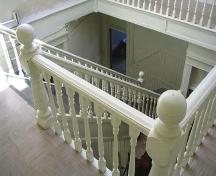 View of the staircase in the Burchill and Howey Block, Brandon, 2005; Historic Resources Branch, Manitoba Culture, Heritage, Tourism and Sport, 2005