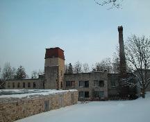Two-Storey stone mill building,  three-storey water tower, brick chimney stack and the remains of the stone wool warehouse.; Sally Drummond, Town of Caledon
