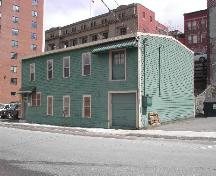 This photograph shows the contextual view of the building looking north on Water Street, 2005.; City of Saint John