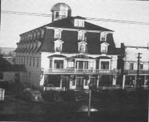 A historic image of the front façade of The Broadway, formerly the Grand Falls Hotel; Archives of the Religious Hospitallers