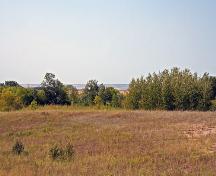 Contextual view, from the southeast, looking across the Campbell Beach Ridge at the Arden Mound and Camp Site, Arden, 2006; Historic Resources Branch, Manitoba Culture, Heritage, Tourism and Sport, 2006