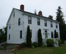 This photograph shows the massing of the home and illustrates the eave returns, 2007.; Town of St. Andrews