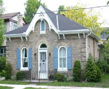 Featured is the semi-circular arched front windows and louvered arch top shutters, 2006.; City of Brantford, Department of Planning, 2006.